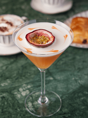 Passion fruit cocktail in a martini glass