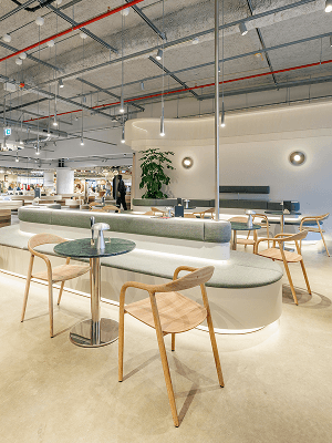 Café Gaia interior with curved sage banquette